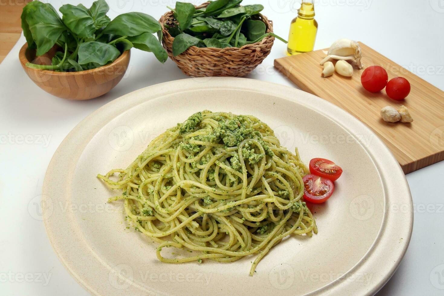 Asian style spaghetti with minced chicken spinach thai basil tomato