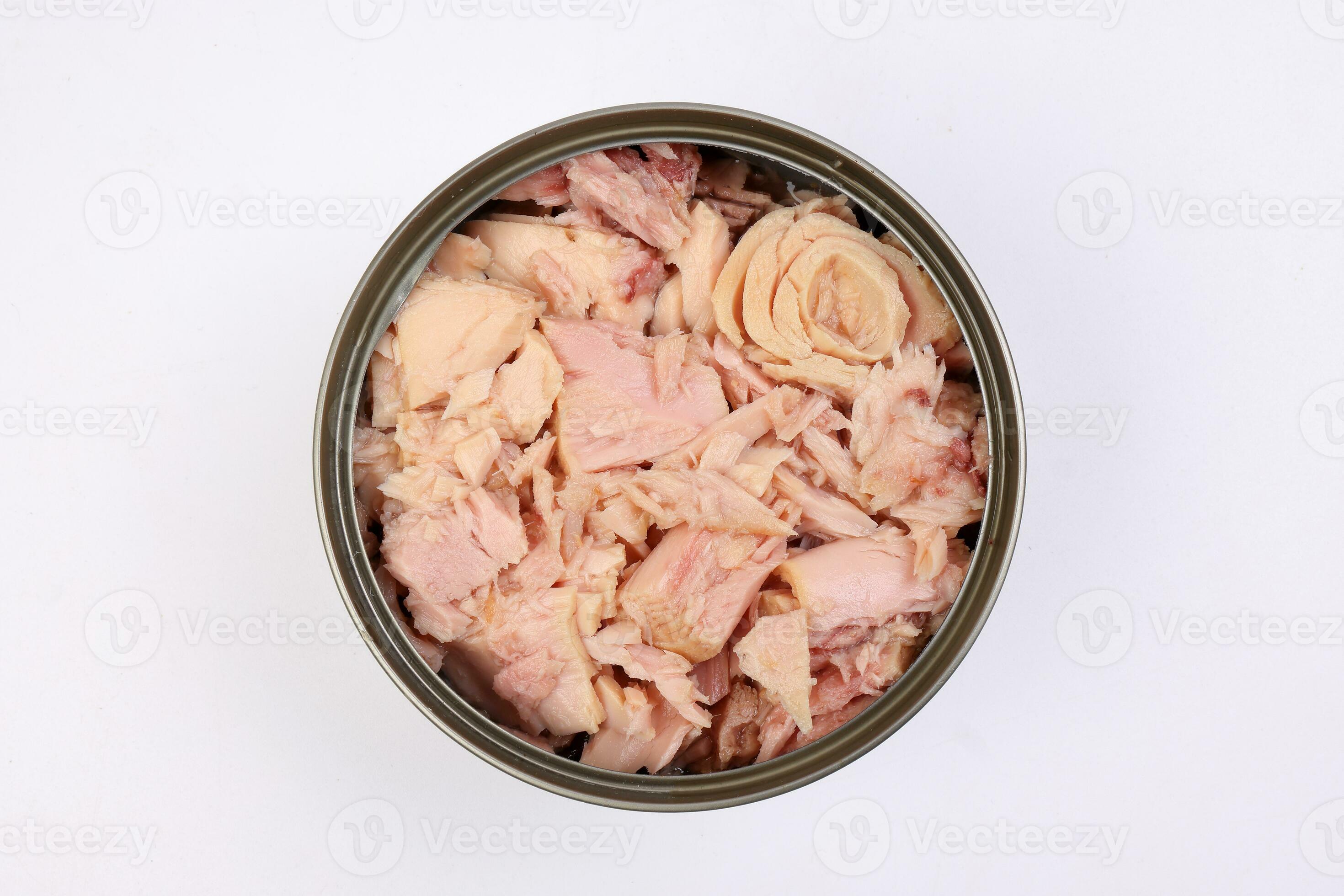 Tuna fish meat flaky chunk in tin can on white background 24327907 Stock Photo at Vecteezy