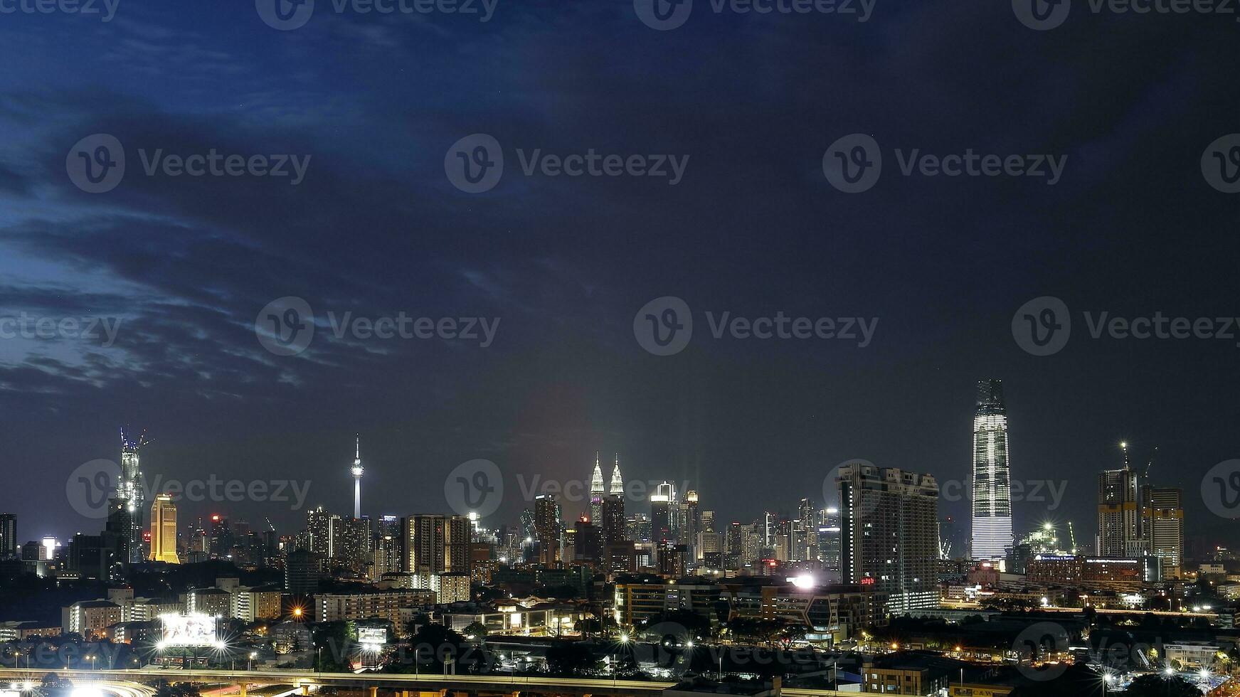 Kuala Lumpur, Malaysia-June 15, 2019 The ever growing city, View of Kuala Lumpur Skyline from top of a building shwoing KL tower,  KLCC  Tun Razak Exchange TRX. photo