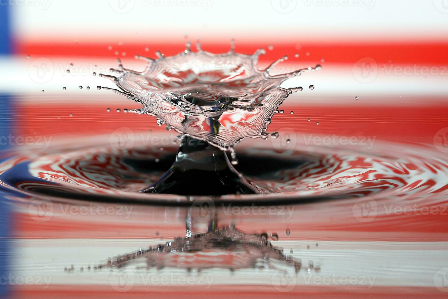 Water droplet drop splash collision dripping pillar Malaysia Flag reflection refraction independence country patriot photo