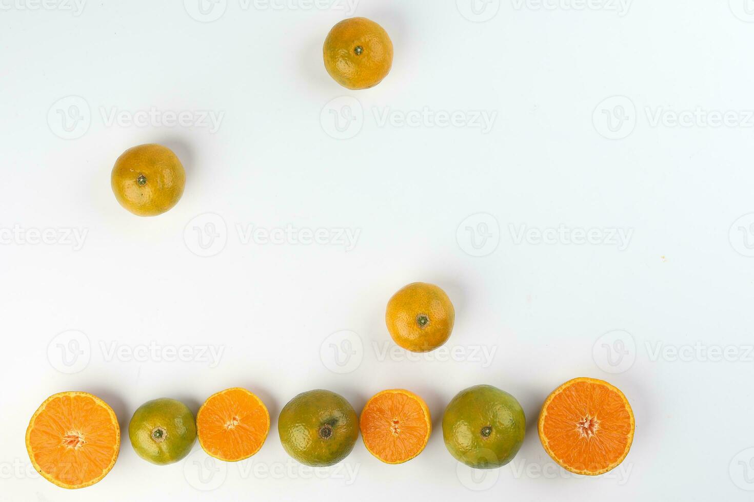 small yellow green mandarin orange whole slice on white background copy space for text frame border photo