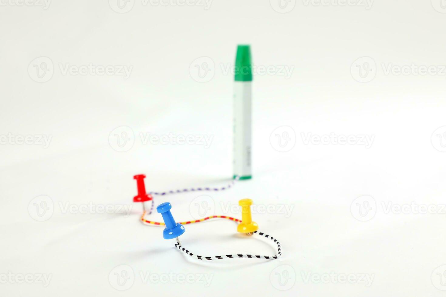 Colorful Paper board pin clip on white background route map photo