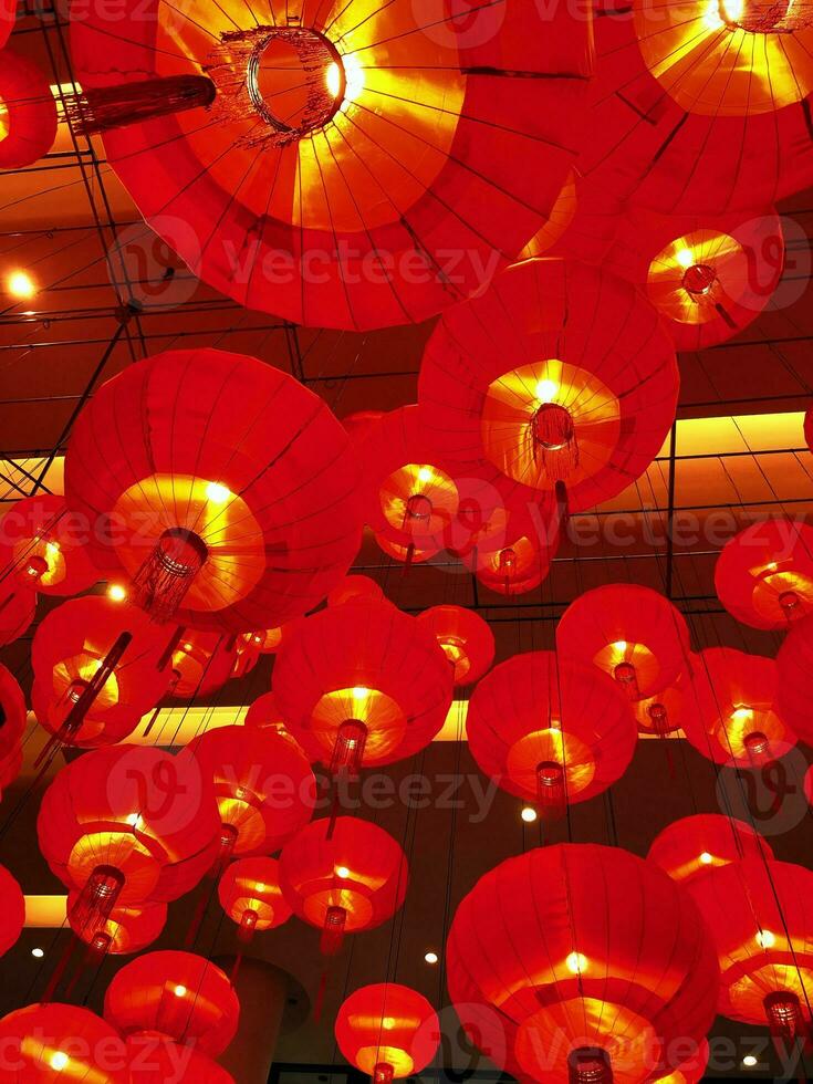 Chinese paper lantern hanging from temple sealing photo