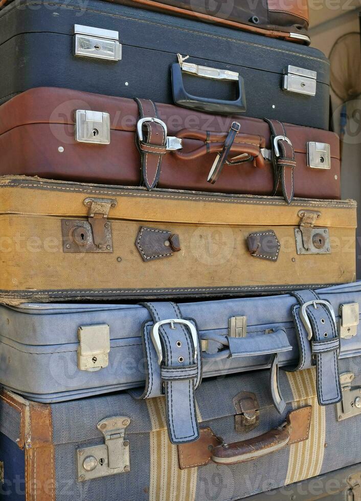 Stack of vintage leather suitcases photo