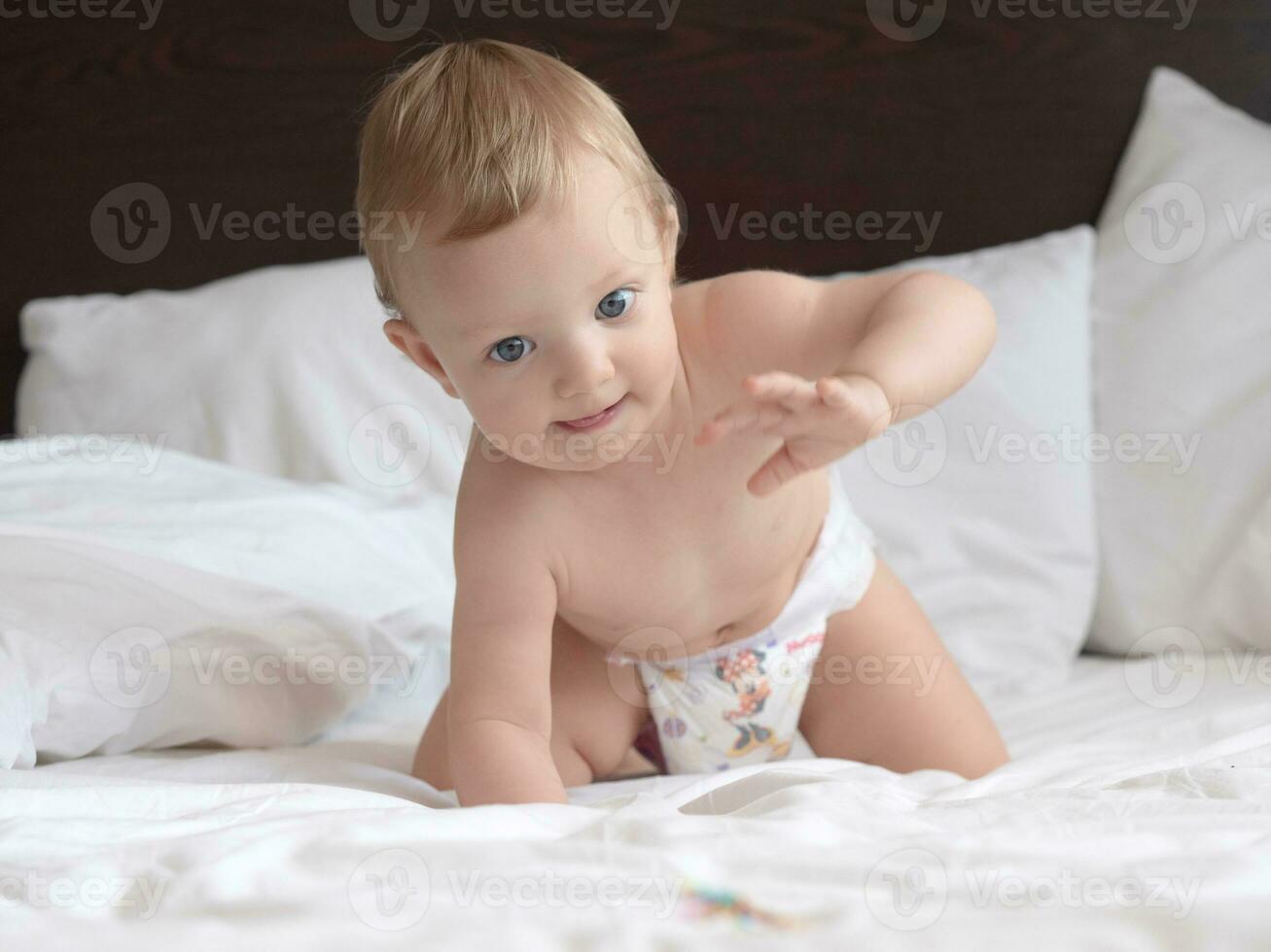 Baby Crawling on The Bed photo