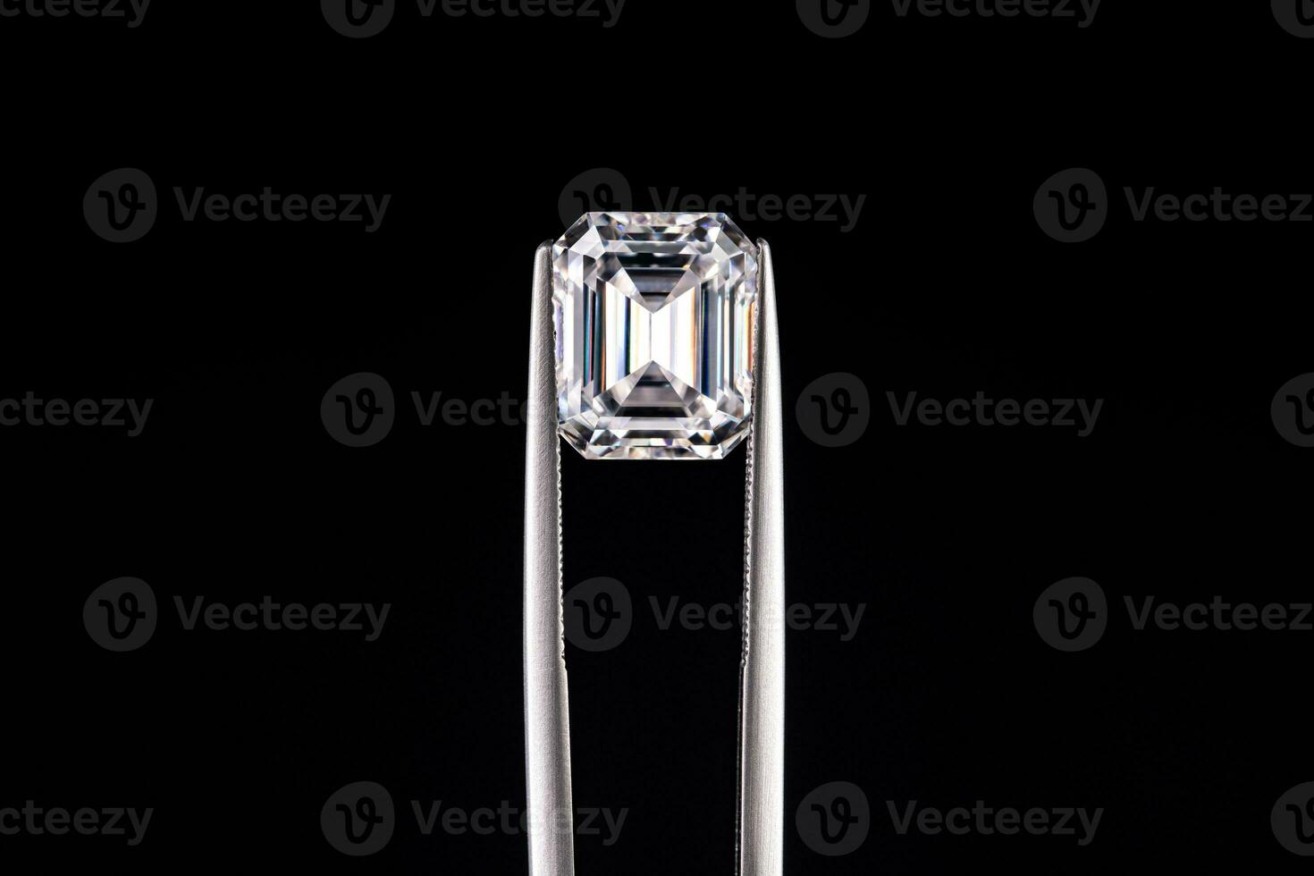 Diamond Gemstone in Jewelry Tweezers photo