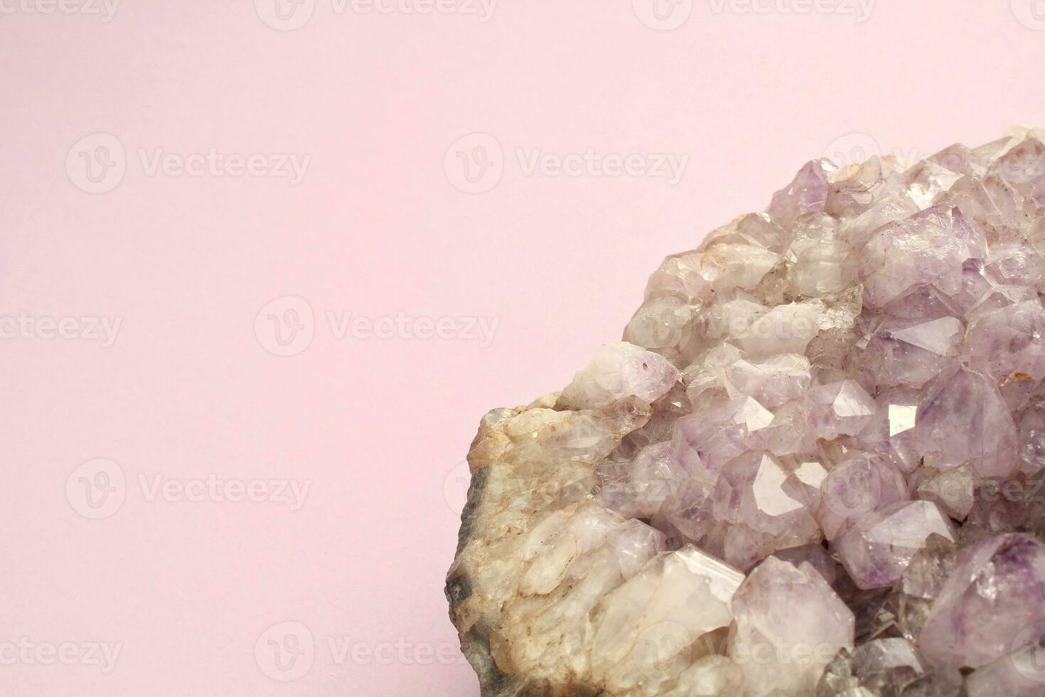 Natural violet amethyst druse geode mineral crystal polished semi-precious gemstone on purple background. Magic rock for witchcraft, spiritual practice, meditation. Esoteric life balance concept photo