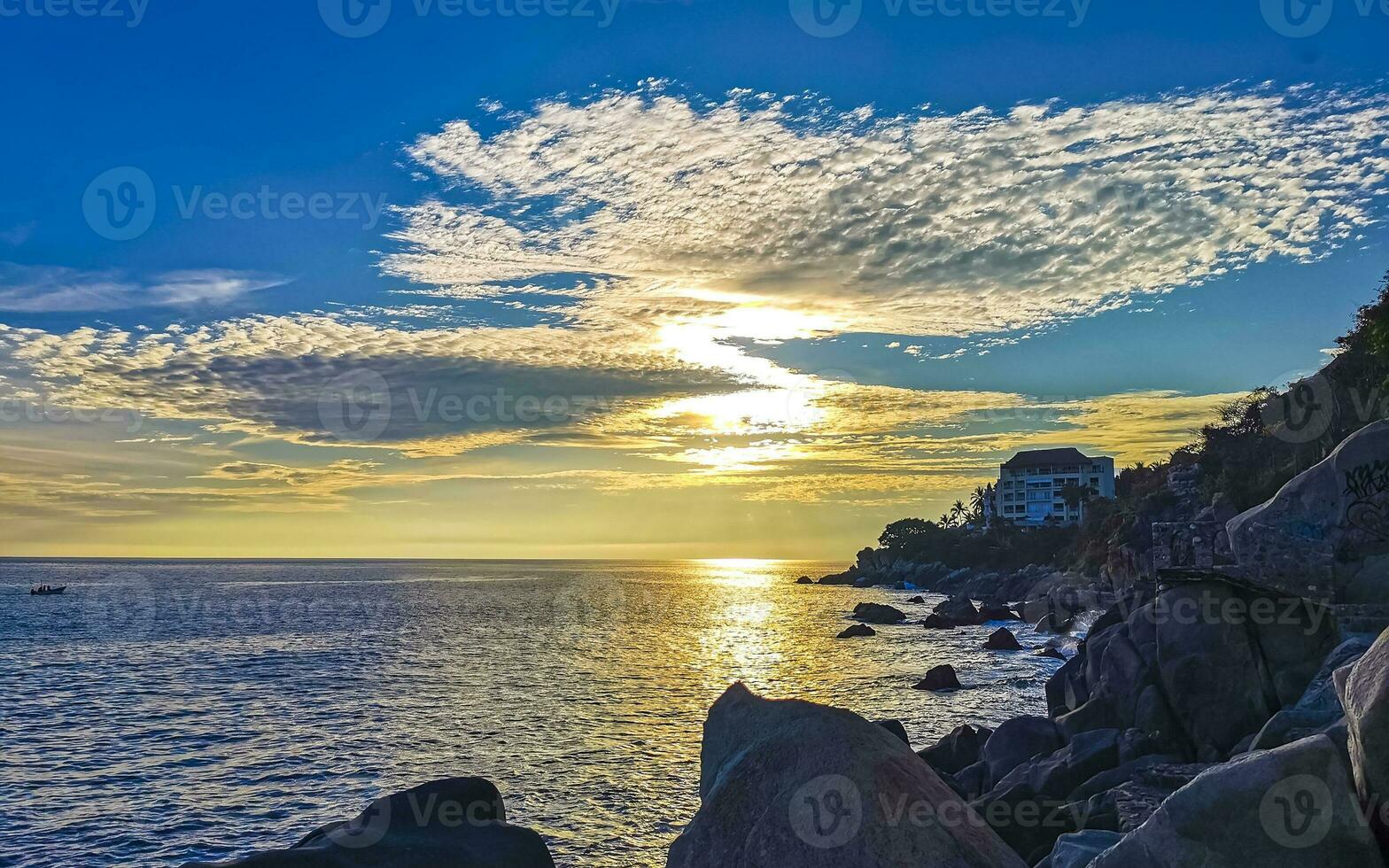 Colorful golden sunset big wave and beach Puerto Escondido Mexico. photo