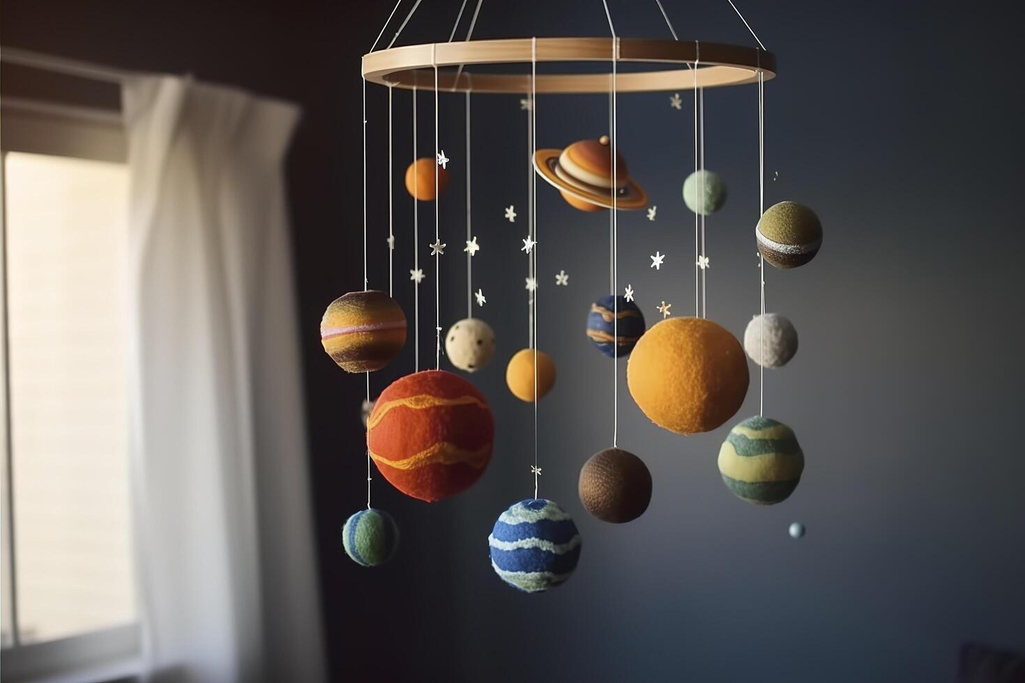 Solar system made of felt, hanging mobile above the baby crib, child toys, science for infants. Baby crib mobile with stars, planets and moon. First baby eco-friendly toys. image. photo