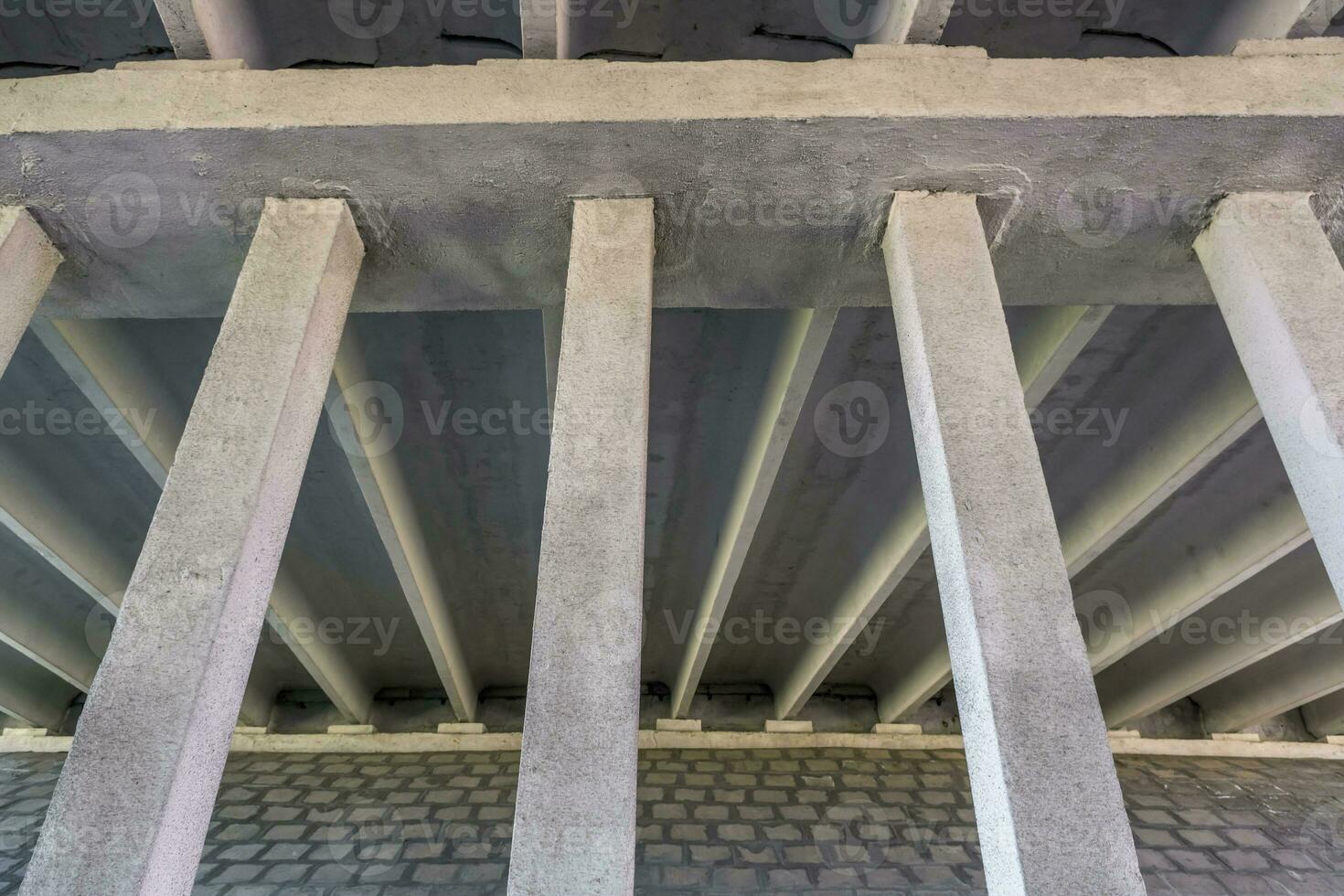 concrete columns like pillars of an automobile bridge photo