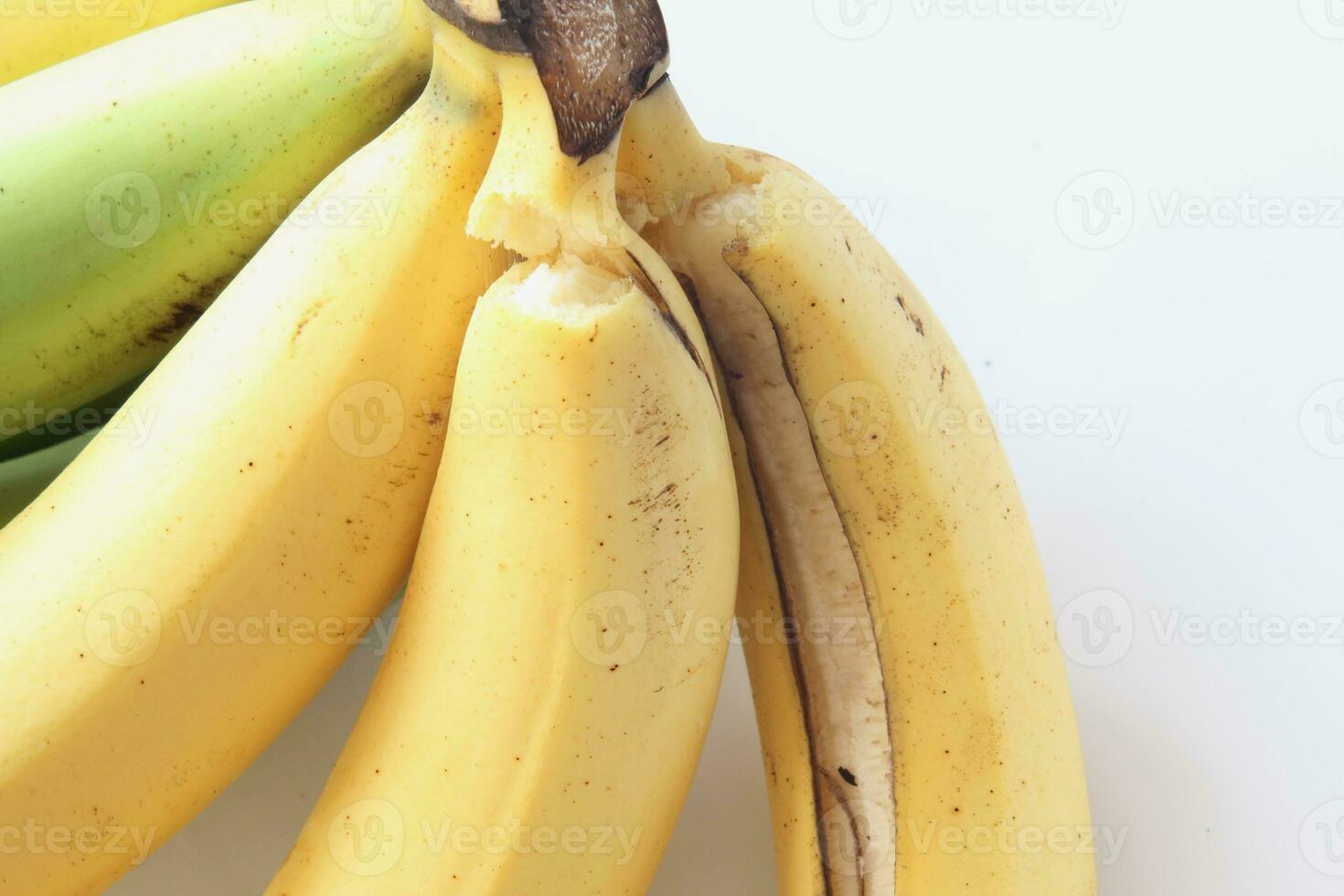 1 combed banana on a white background. photo