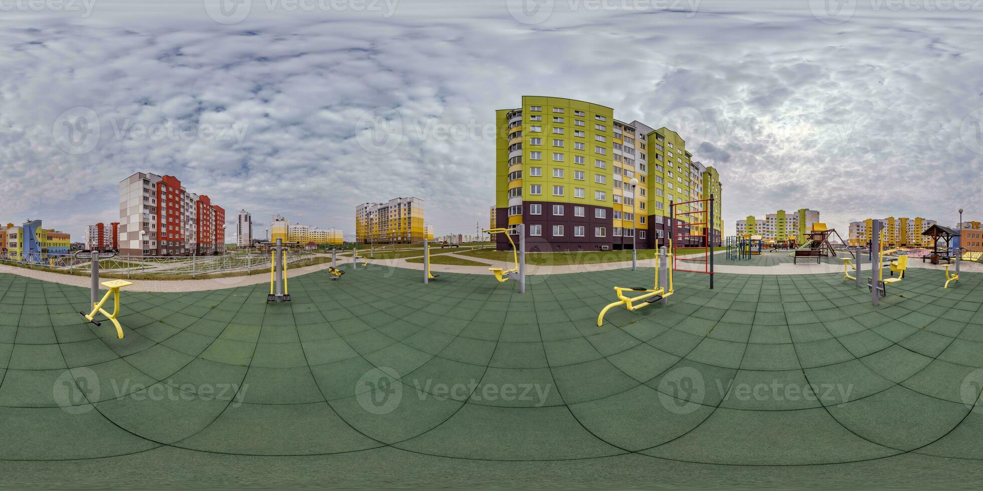 360 hdri panorama view outdoor exercise equipment gym among modern residential complex with skyscrapers and high-rise buildings in equirectangular spherical projection ready VR virtual reality content photo