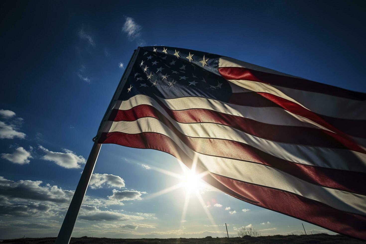 Backlit us national flag flying and waving in the wind over gray stormy cloudy sky, symbol of american patriotism, low angle, generate ai photo