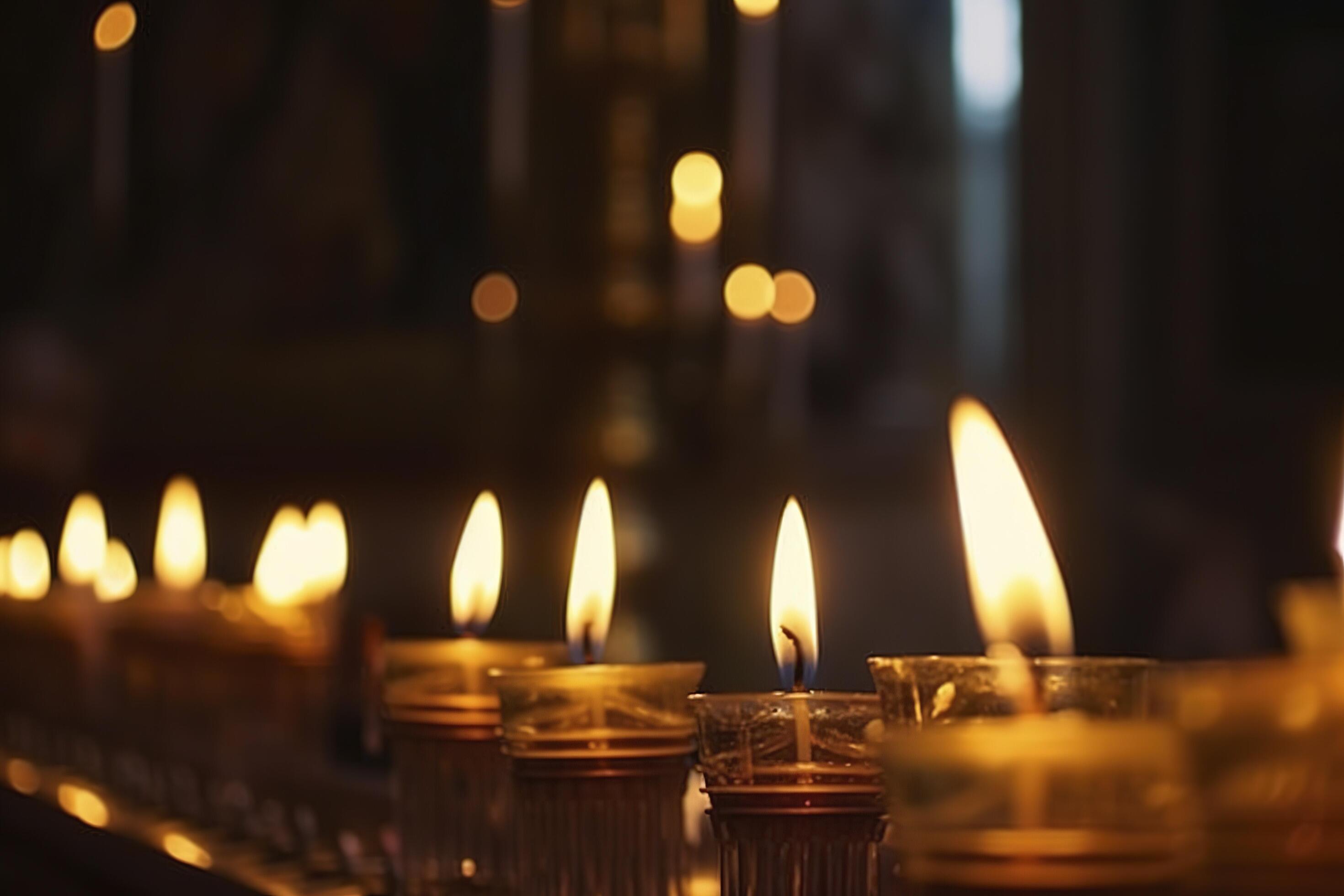 Candles in a Christian Orthodox church background. Flame of candles in