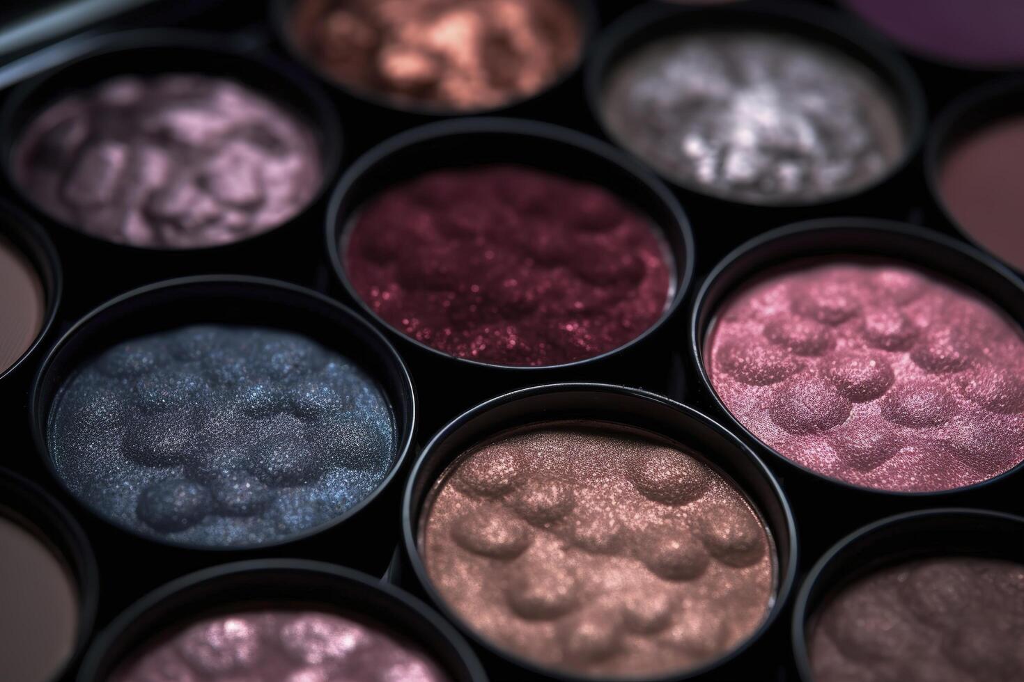 Closeup shot of eyeshadow, cosmetics, makeup. Professional eyeshadow palette macro shot. Eye shadow collection, make up theme. . photo