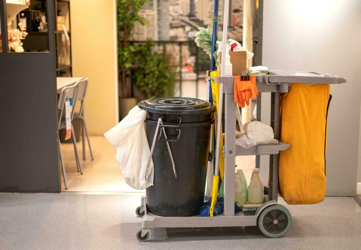 Cleaning tools cart and equipment parked walkway at the public area for prepare cleaning. photo