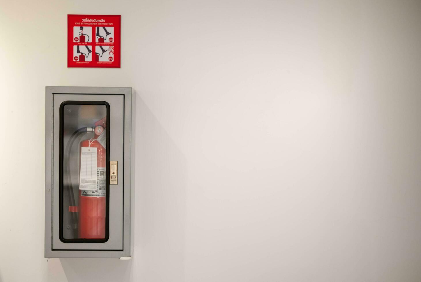 Fire alarm on the wall in subway in Bangkok,  At the Bangkok subway fire warning equipment for emergency. photo