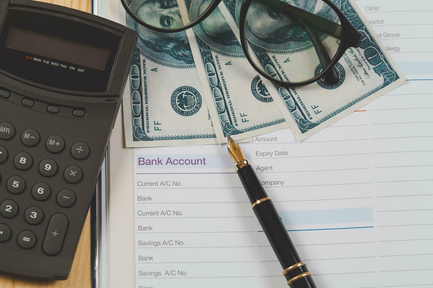 bank account in book note with fountain pen for business financial photo