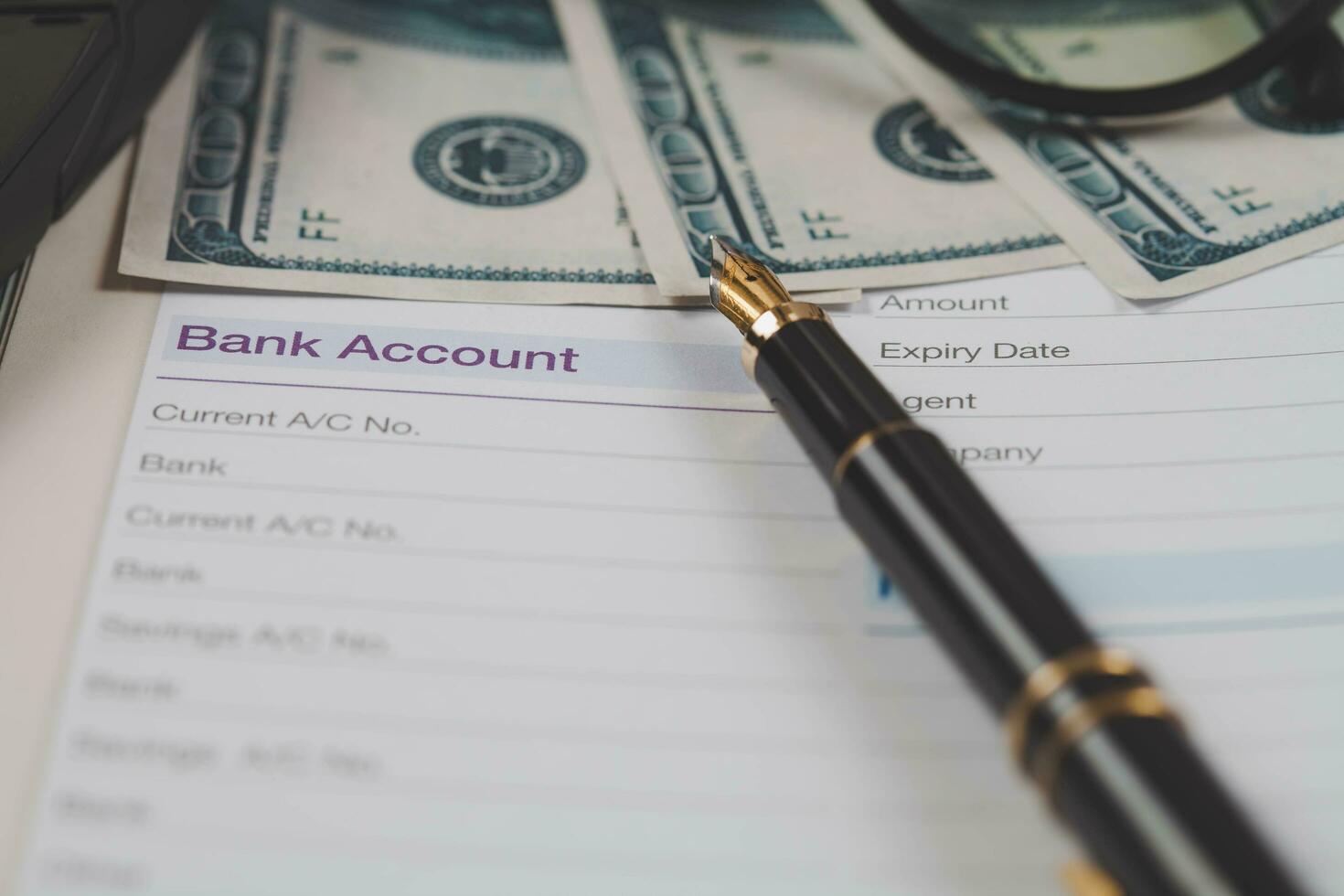 bank account in book note with fountain pen for business financial photo