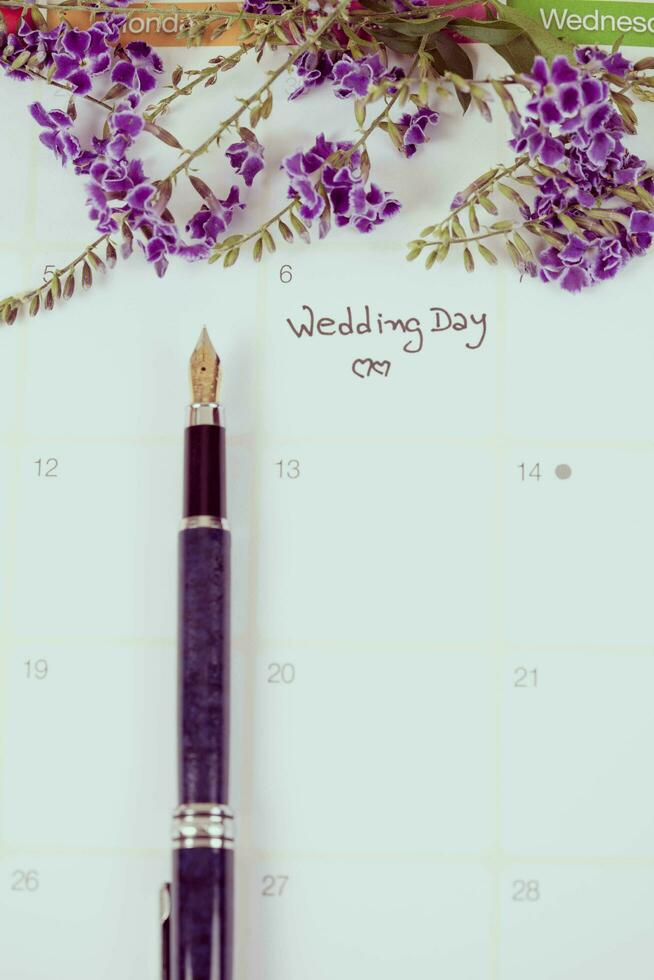 Reminder Wedding day in calendar planning and fountain photo