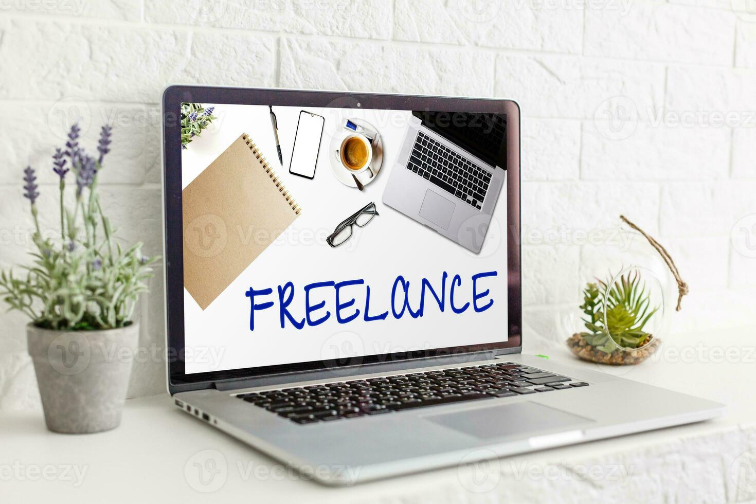 Home freelance desktop with open laptop computer on the table, blank screen for information content or text message photo