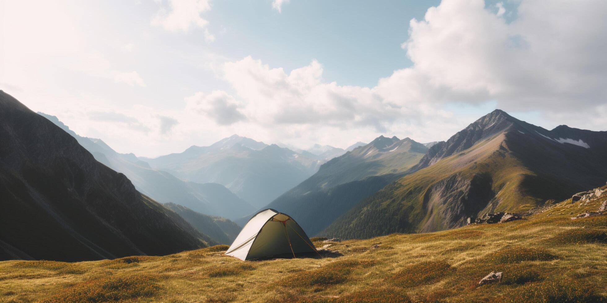 Mountain landscape with tent photo