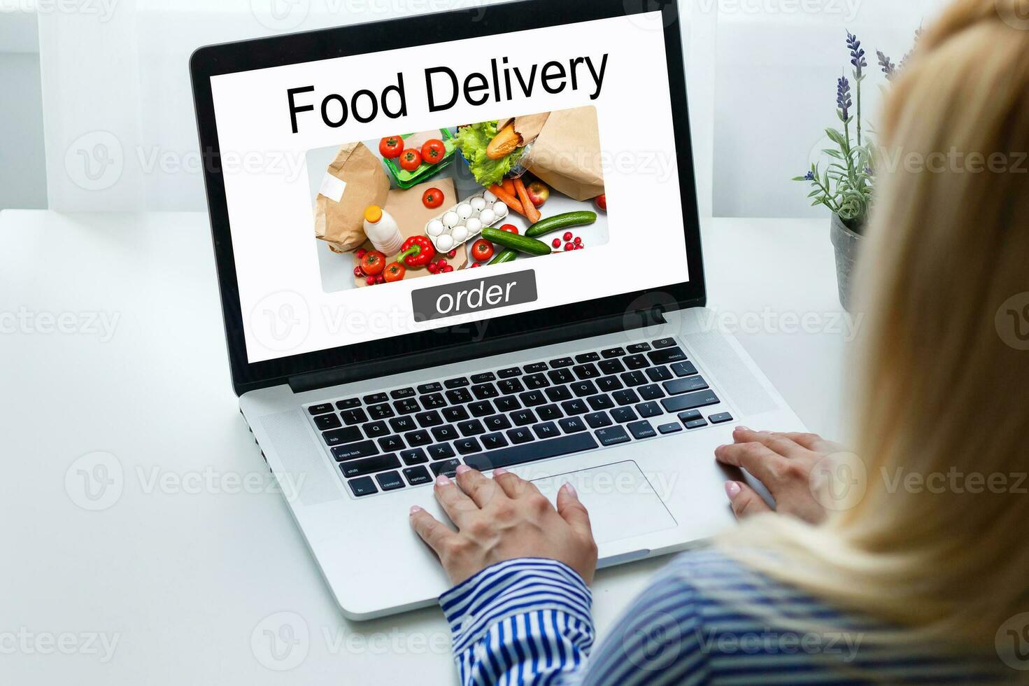 Close up woman sitting and orde food online on laptop computer in add to cart function webpage at coffee shop,Digital marketing concept.digital lifestyle living photo