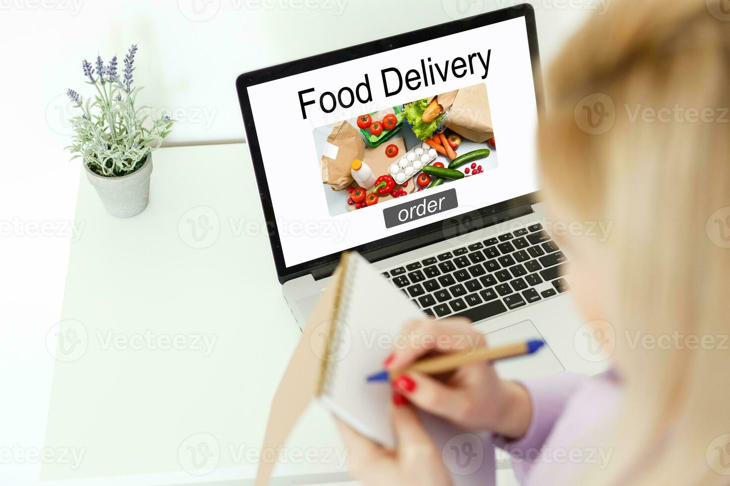 Close up woman sitting and orde food online on laptop computer in add to cart function webpage at coffee shop,Digital marketing concept.digital lifestyle living photo