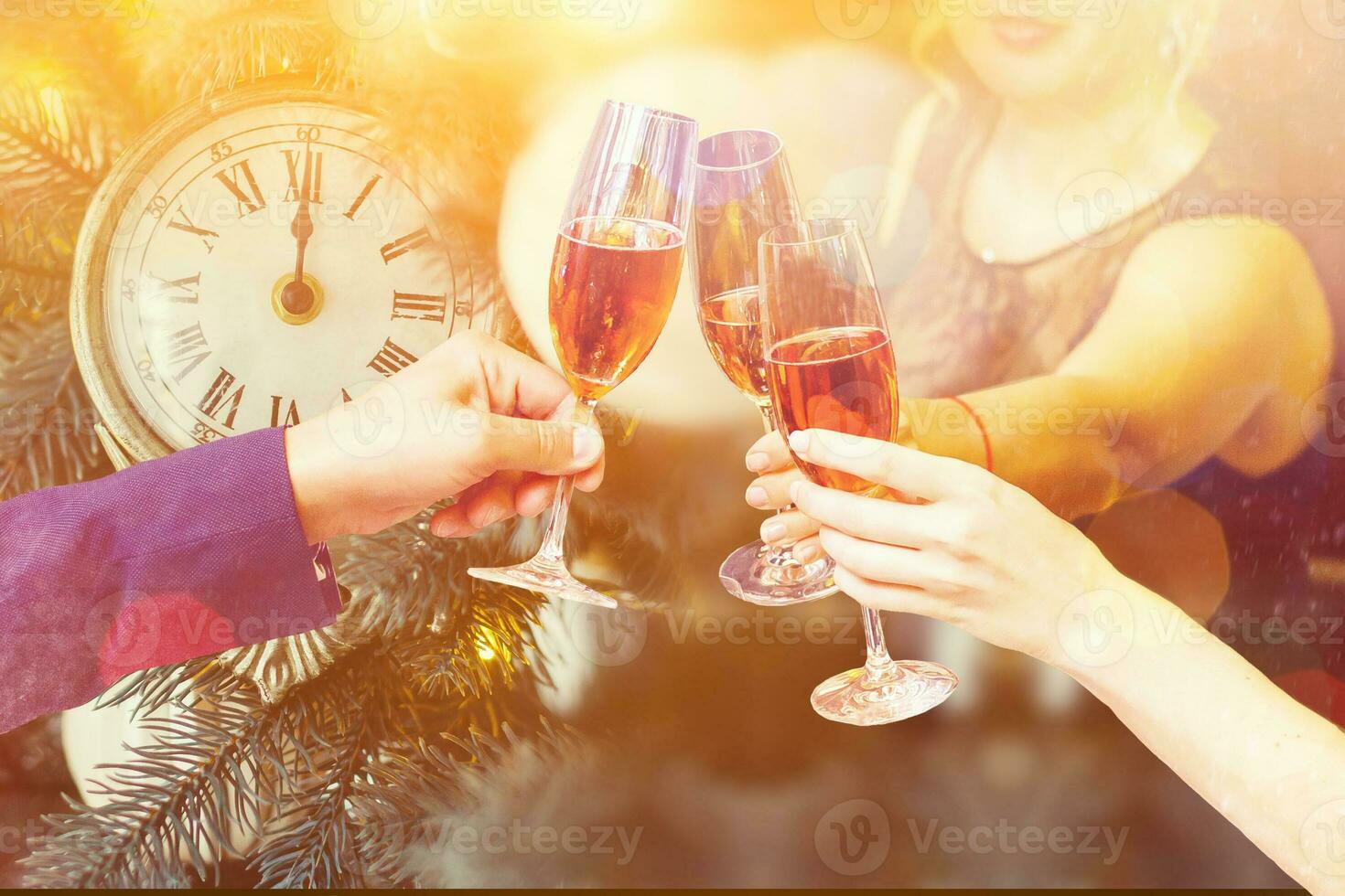 Two glasses of champagne with lights in the background. christmas background photo
