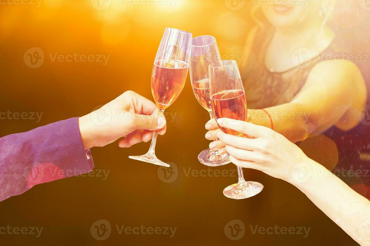 Two glasses of champagne with lights in the background. christmas background photo