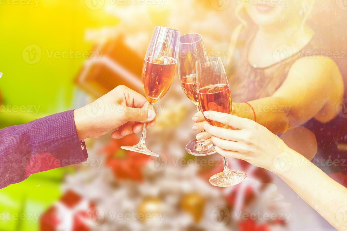 Two glasses of champagne with lights in the background. christmas background photo