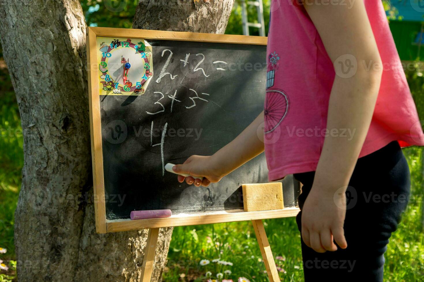 girl decides on a slate board examples photo