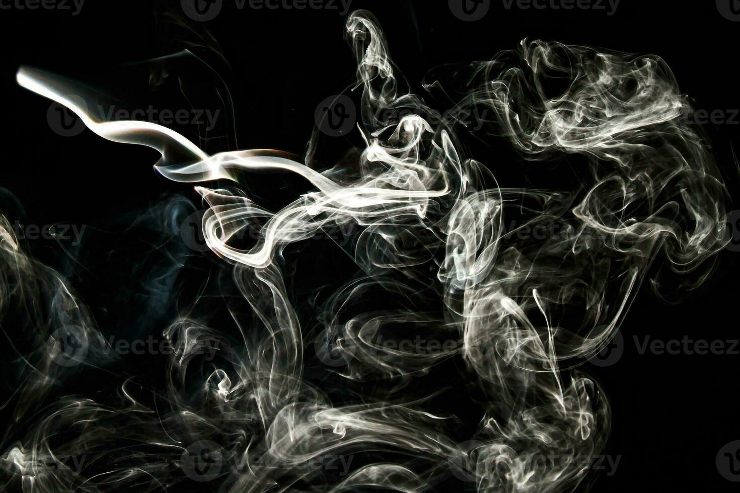 Smoke effect texture. Isolated background. Black and dark backdrop. Smokey fire and mistic effect. photo