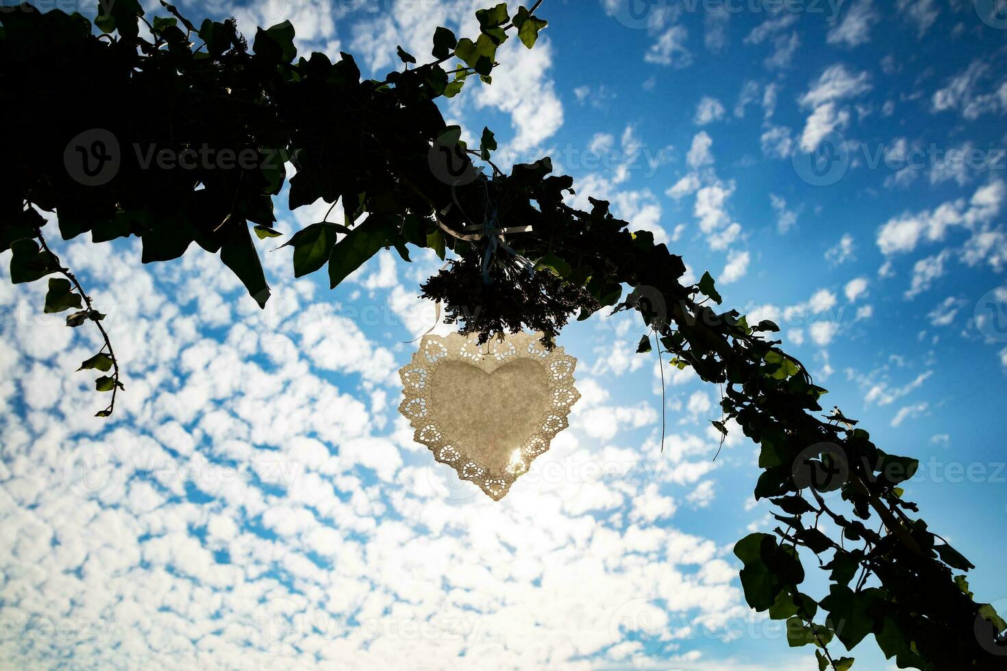 Beautiful wedding decoroation. White paper heart. photo