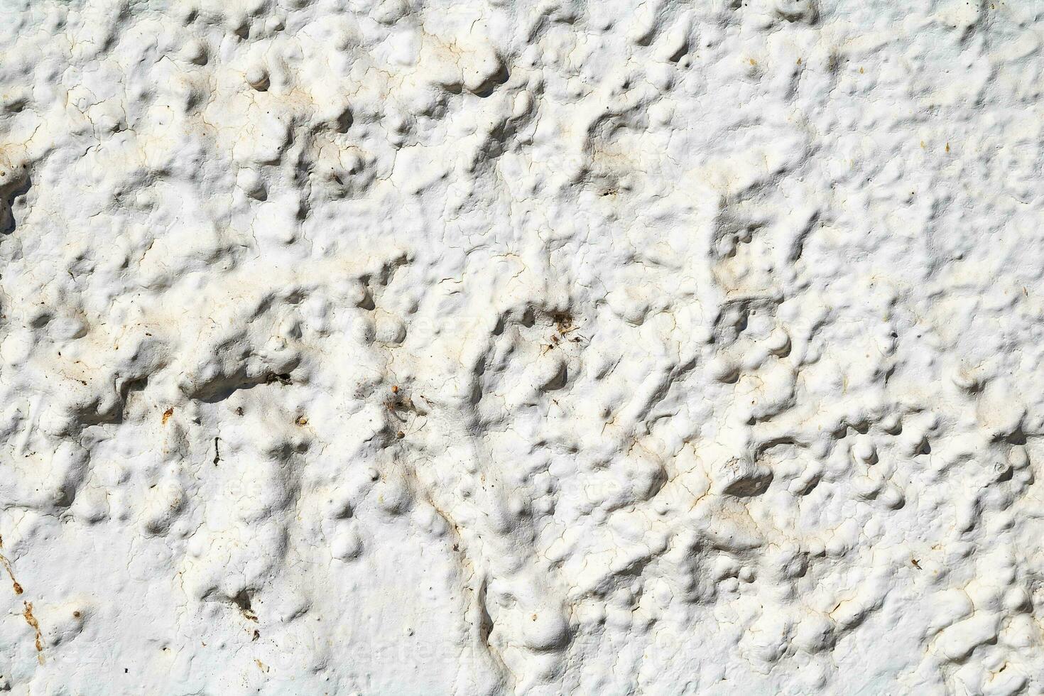 Cracked and abstract grunge texture. Aged material surface backdrop. Weathered effect pattern. Old and dirty background. photo