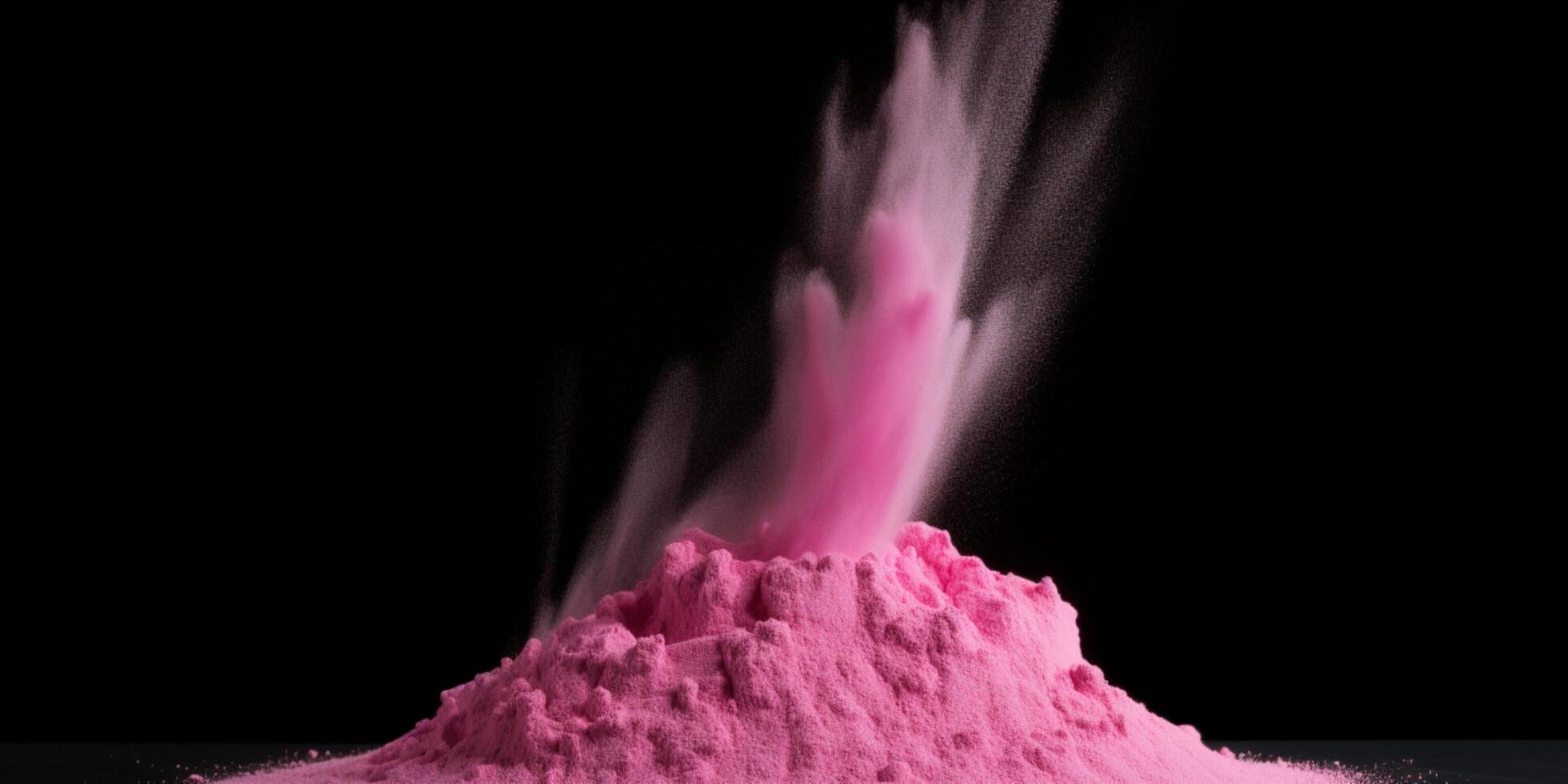 Pink powder is dropped into pile photo