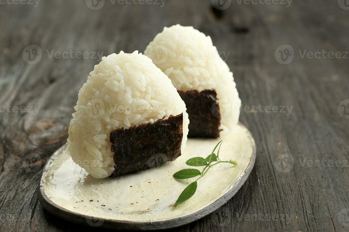 Triangle Onigiri, Japanese Rice packed Ball with Nori photo