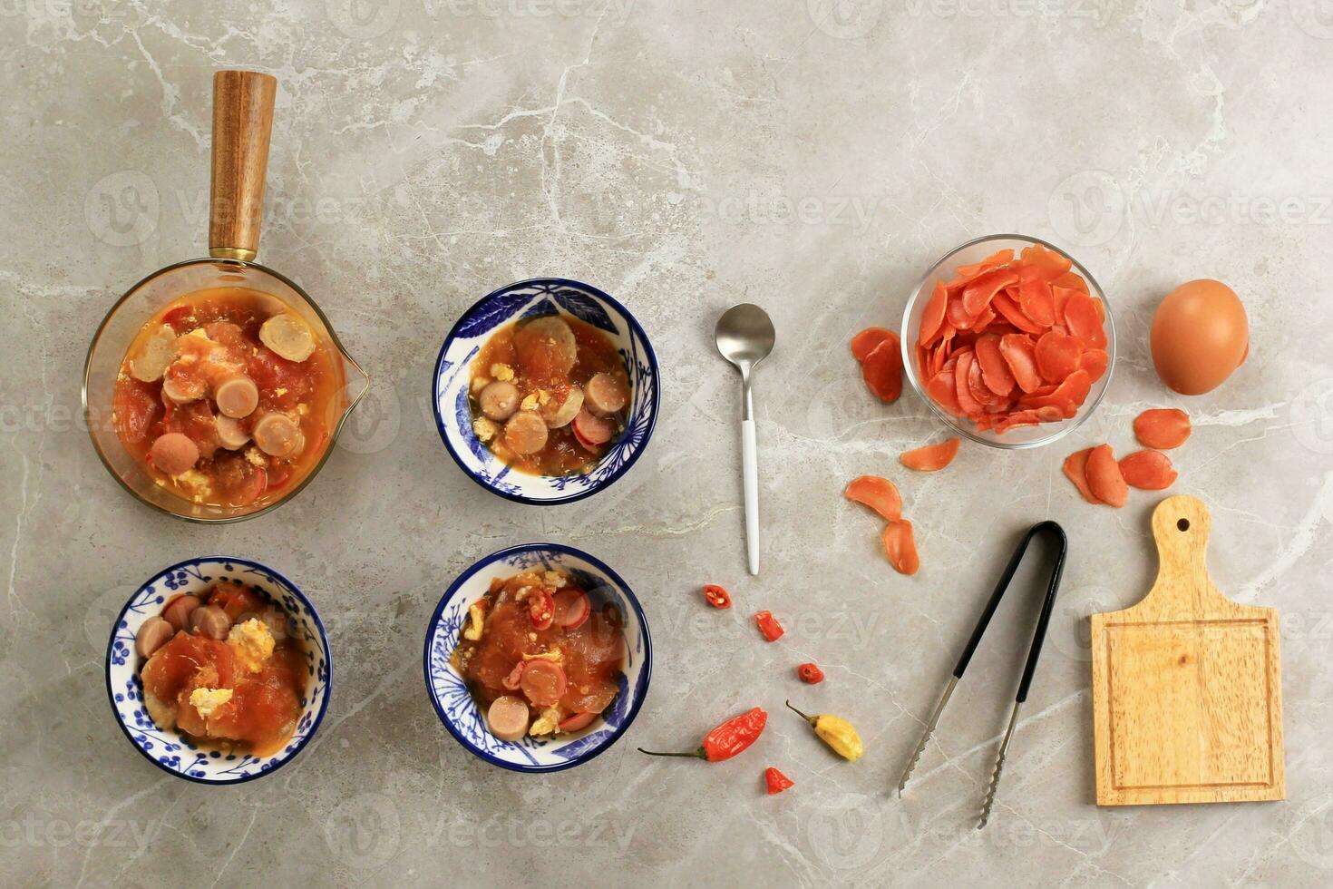 Seblak Bandung, Spicy Stew made from Stir Fry Cracker with various Topping. photo