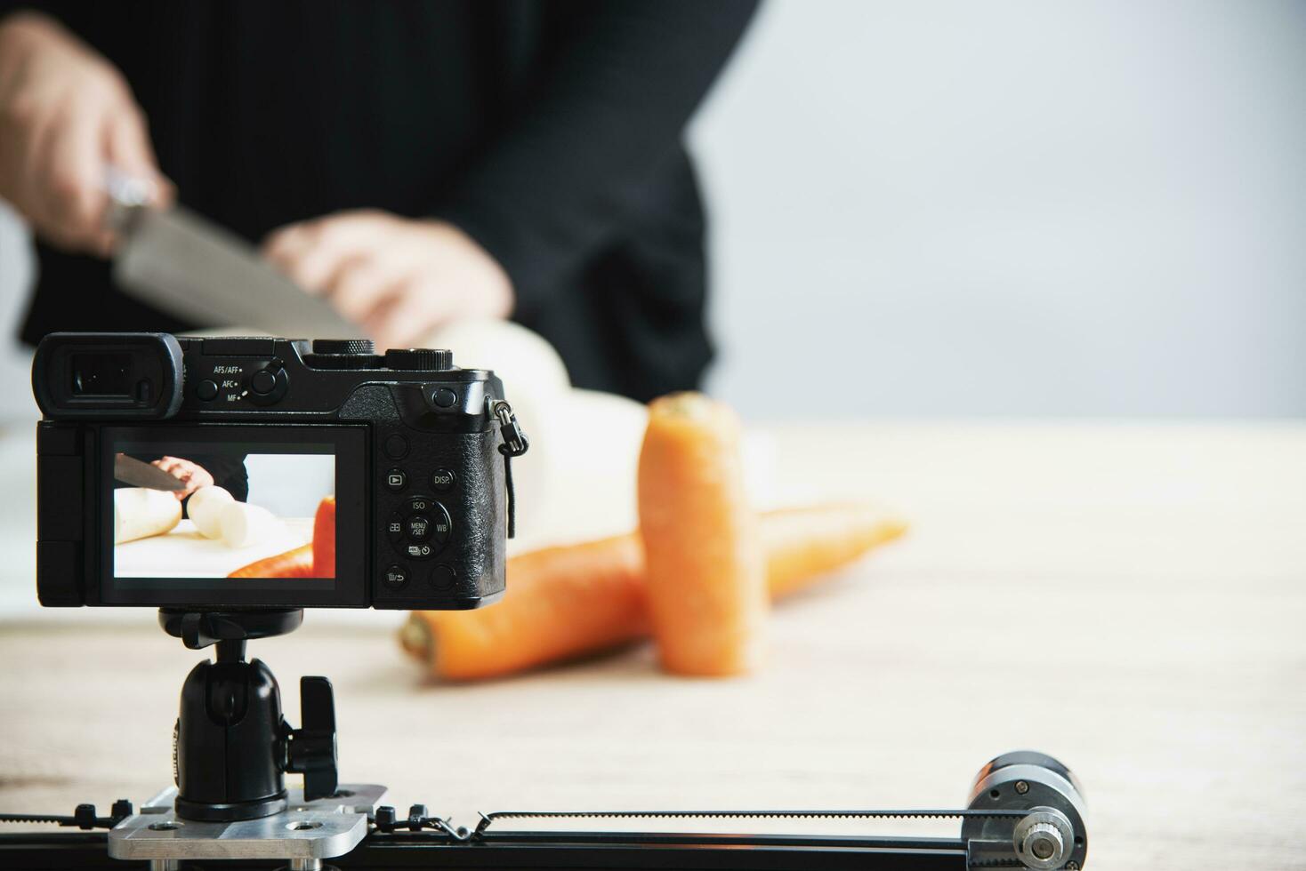 people using digital camera taking food photograph or video studio production photo