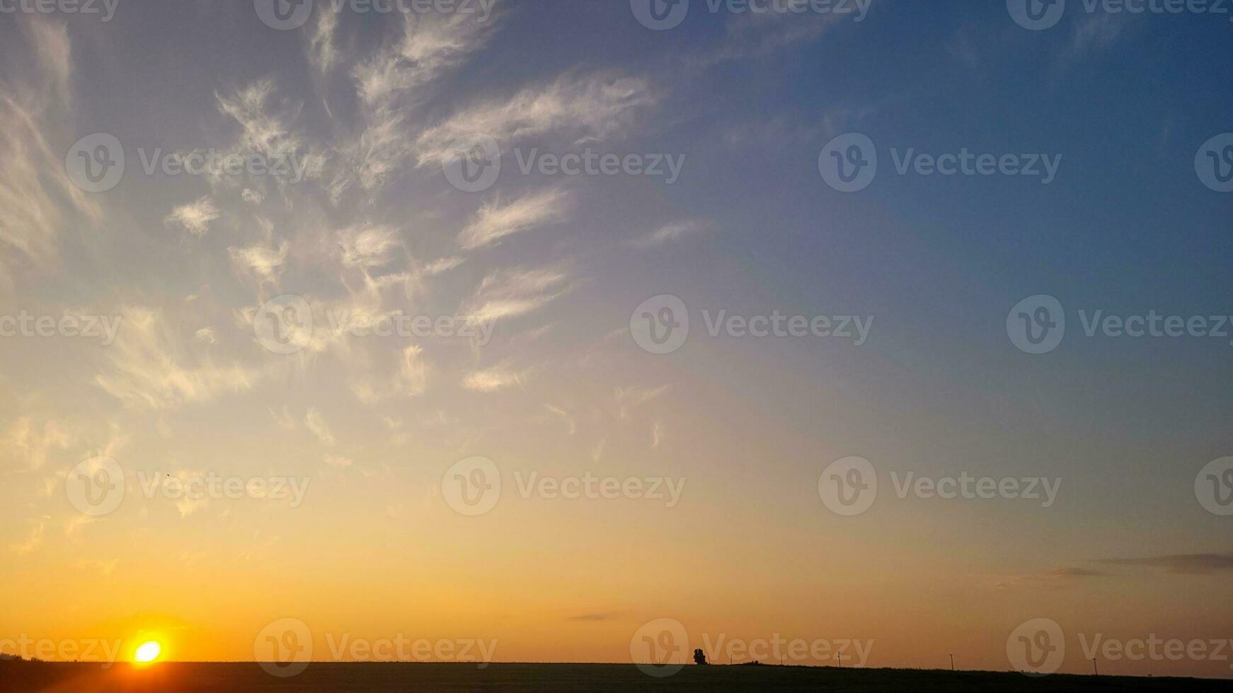 sunset in the middle of nature on a farm photo