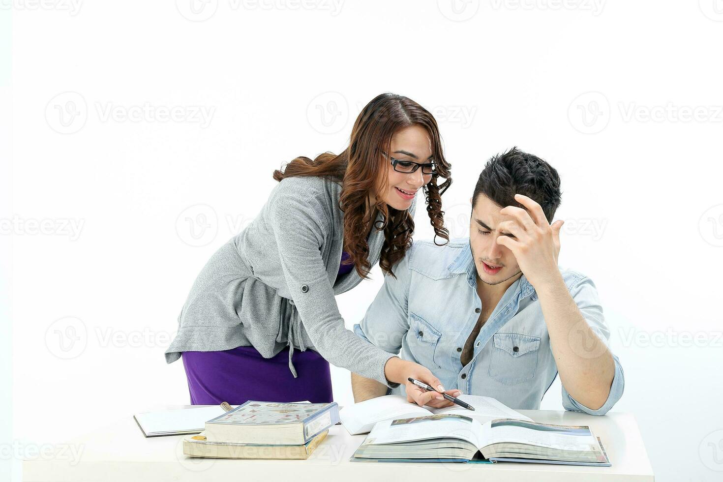 Yong south east Asian middle eastern Caucasian youth man woman in casual dress sit stand at table book notebook pen talk study think rad on white background photo