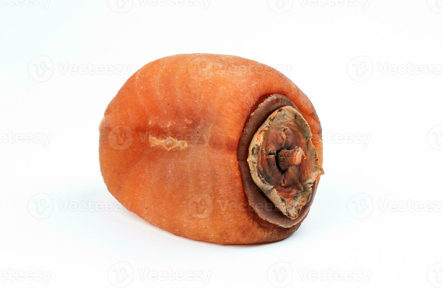 dried permission fruit on white background photo