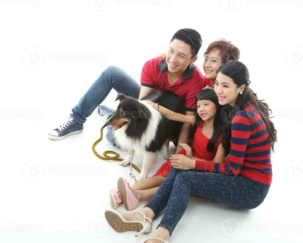 Southeast Asian multigeneration family parents daughter grandmother father mother child pose happy sit stand photo