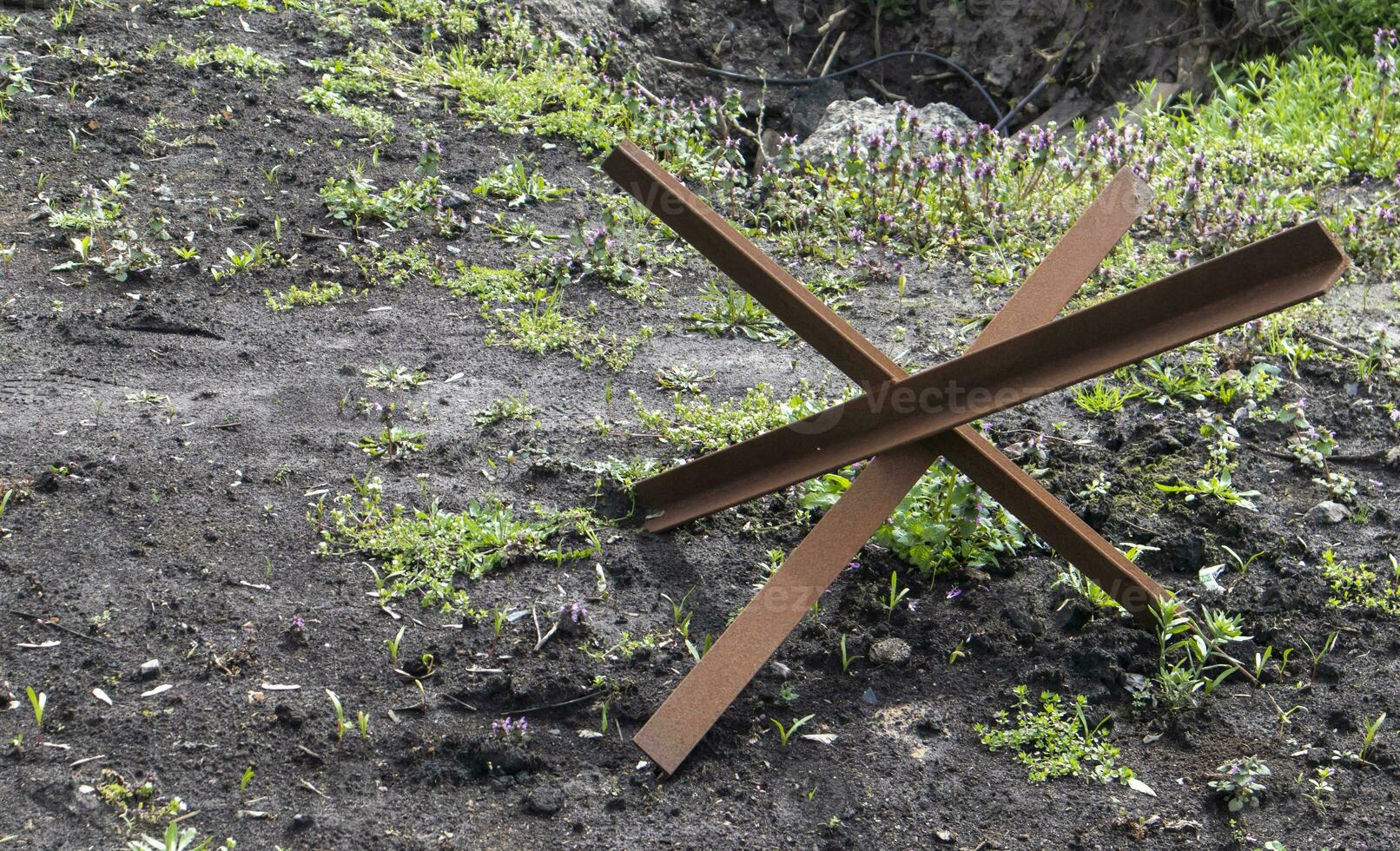 War of Russia against Ukraine. Anti-tank hedgehogs on the streets of a Ukrainian city. Readiness for invasion, roadblocks, fences. photo