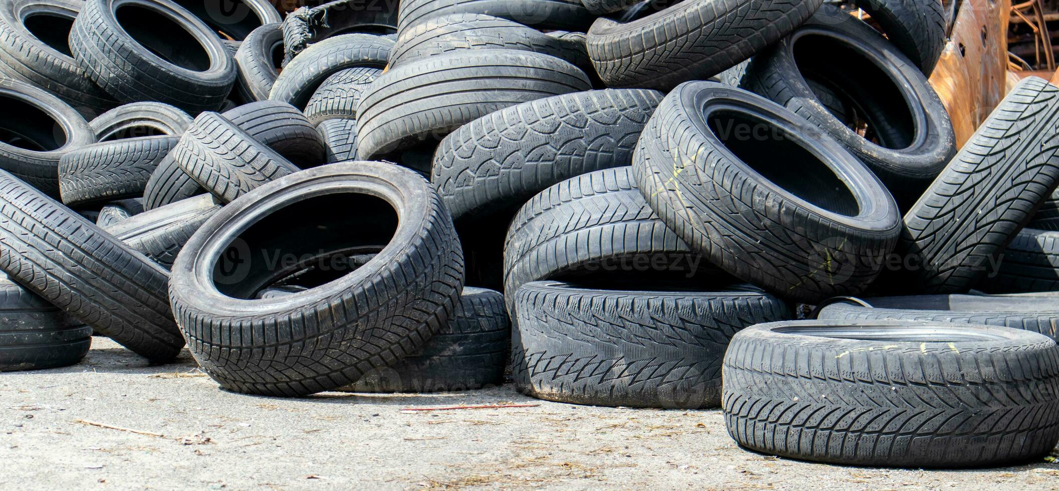 Industrial dump for the processing of used tires and rubber tires. Pile