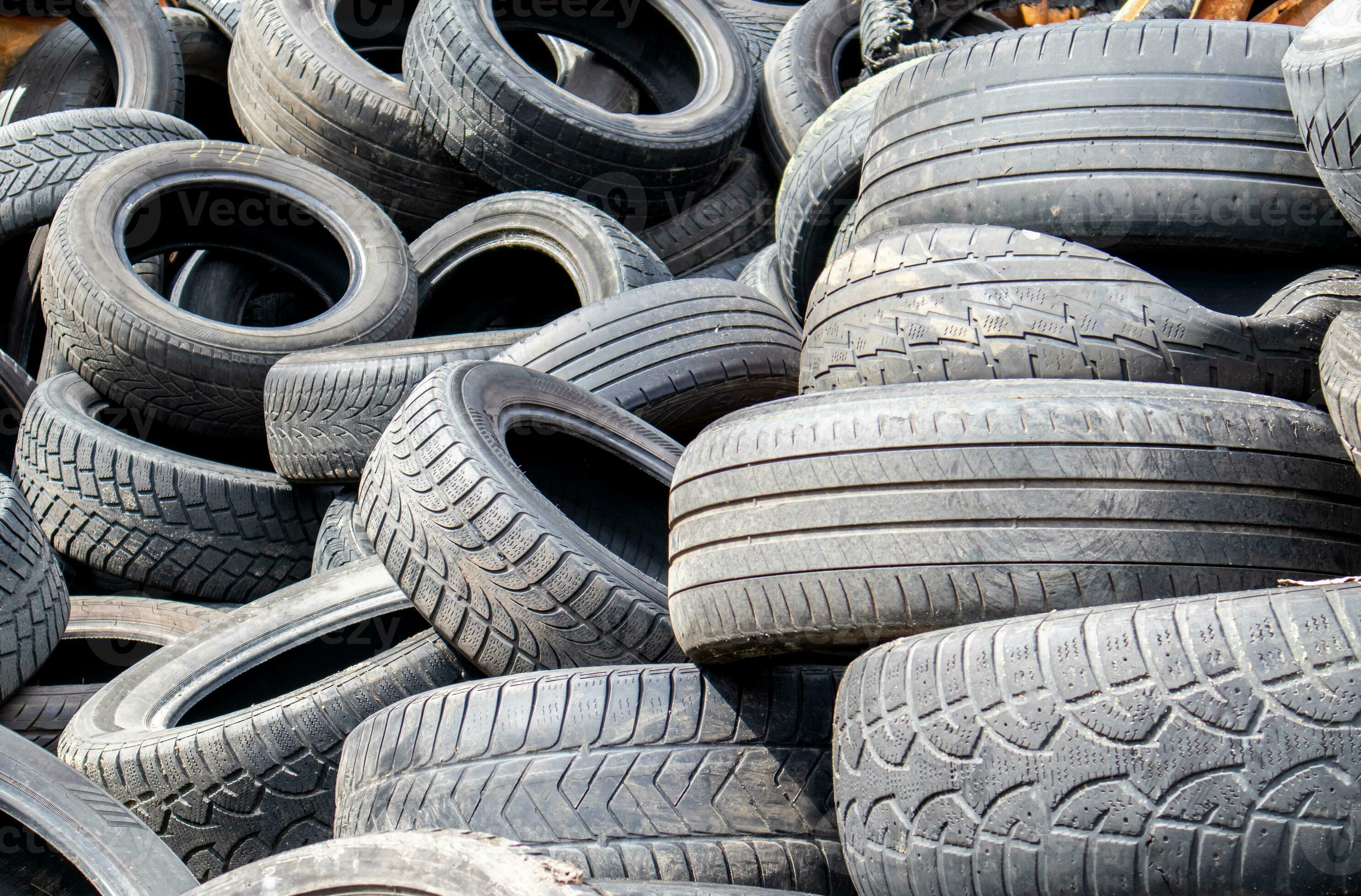 Garbage from a pile of black old car tires. Environmental pollution
