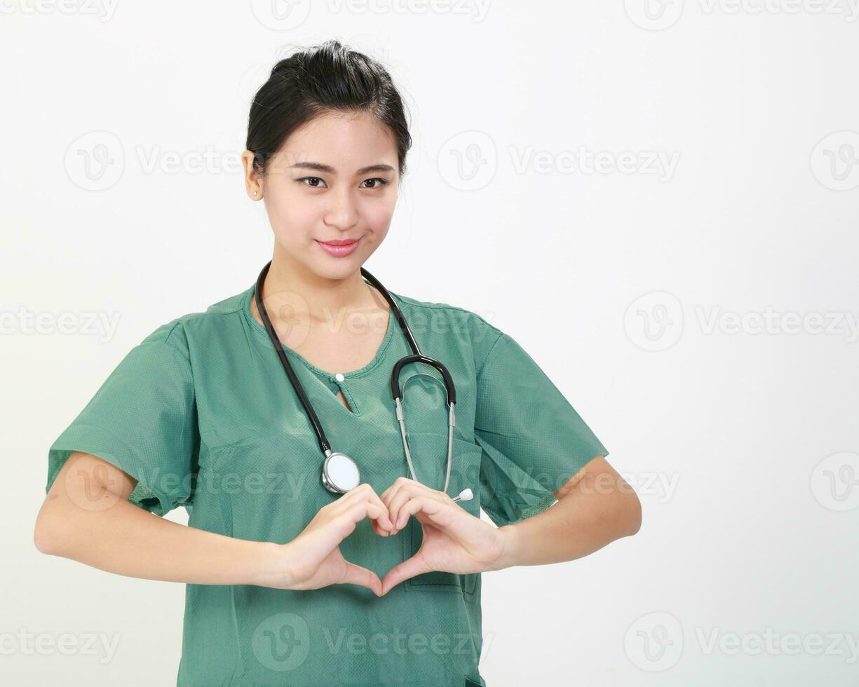Young Asian female doctor wearing apron uniform tunic hold photo