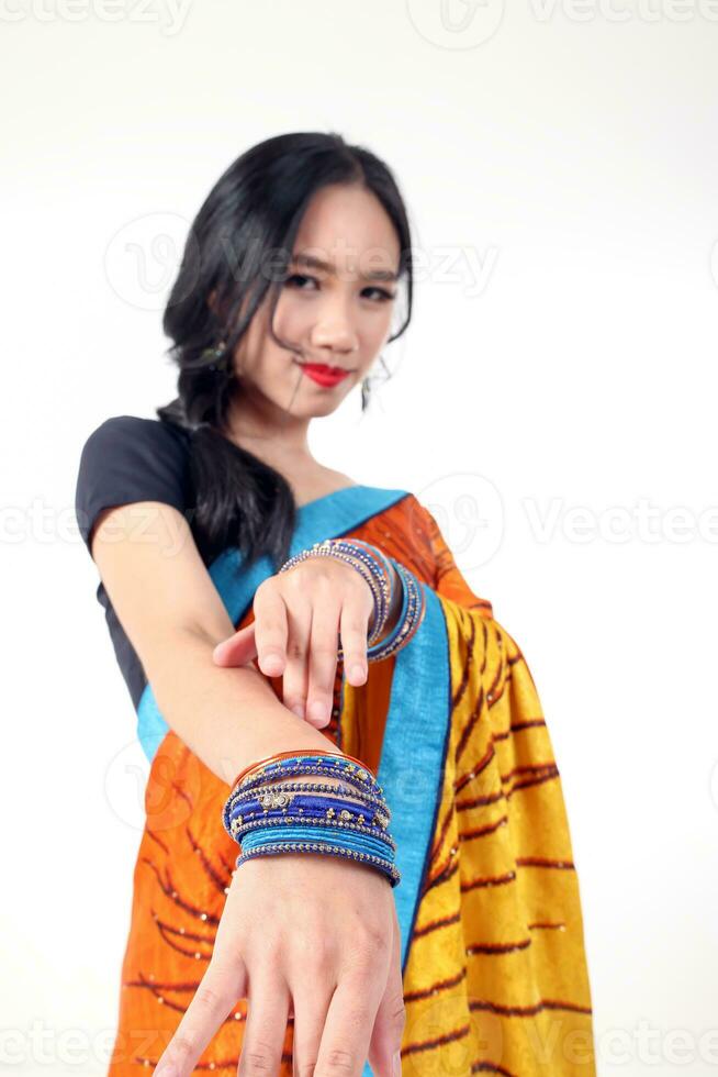 South east Asian Chinese race ethnic origin woman wearing Indian dress costume Sharee multiracial community on white background photo