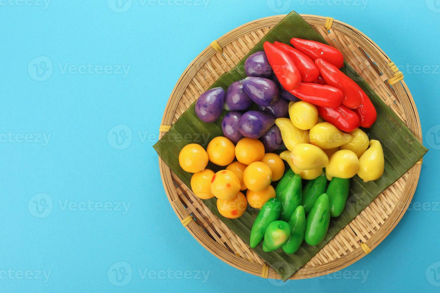 Colourful Luk chup look choop tadeonal Thai desert sweets candy creatve variety bamboo plate banana leaf photo