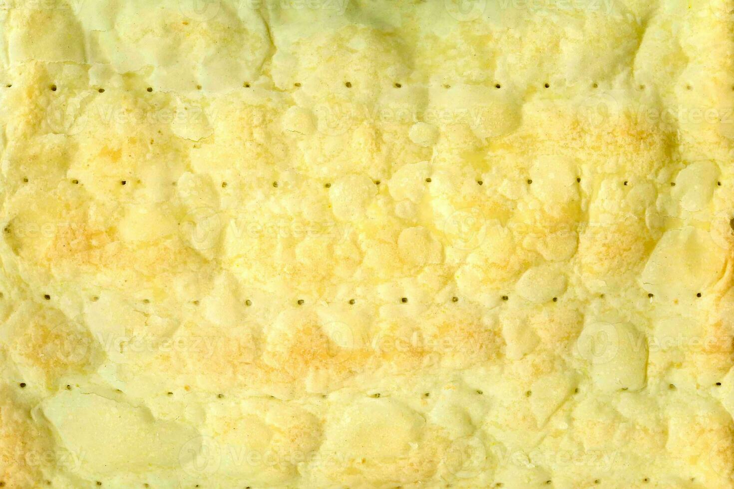 Cake layers isolated. Cake making. The texture of the cake for making Napoleon cake from puff pastry and custard. Culinary background for posters and advertising with space for text. photo